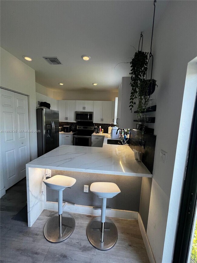 Building Photo - 5942 Mustang Manor