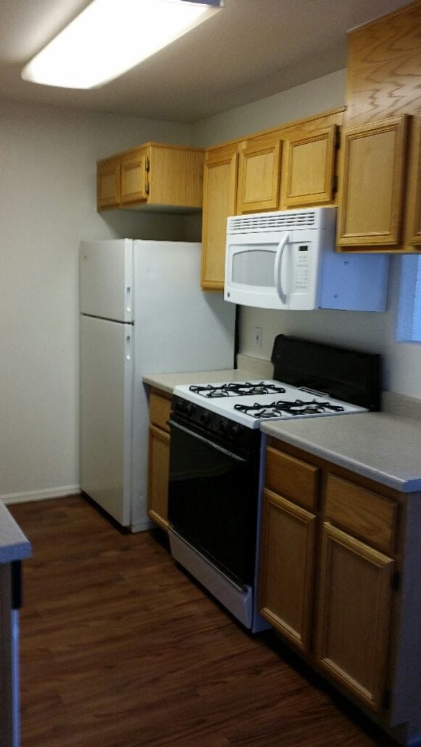 Building Photo - We Pay Referrals - A Move-In Ready Condo!