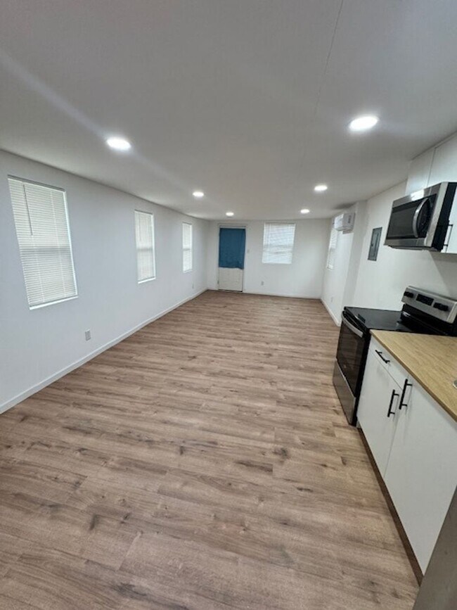 Building Photo - Conveniently Located Home with Attached Studio!