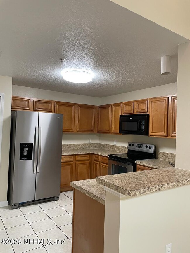 Building Photo - 6985 Ortega Woods Dr