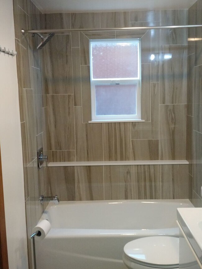 Building Photo - Charming remodeled lower unit with amazing yard and laundry