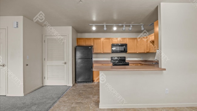 Building Photo - Don't miss an opportunity to live at the well kept Wind River Apartments in Rifle!