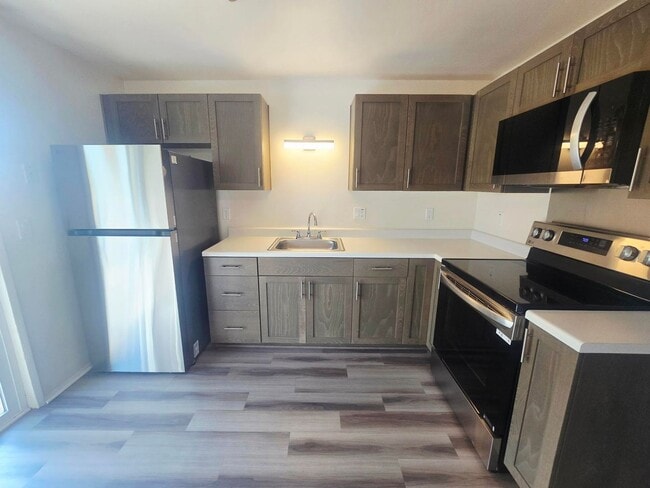 Building Photo - Newly Renovated Apartment Homes available ...