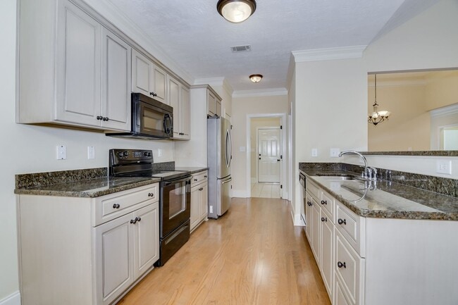 Building Photo - Heart of Evans - Landscaping Included