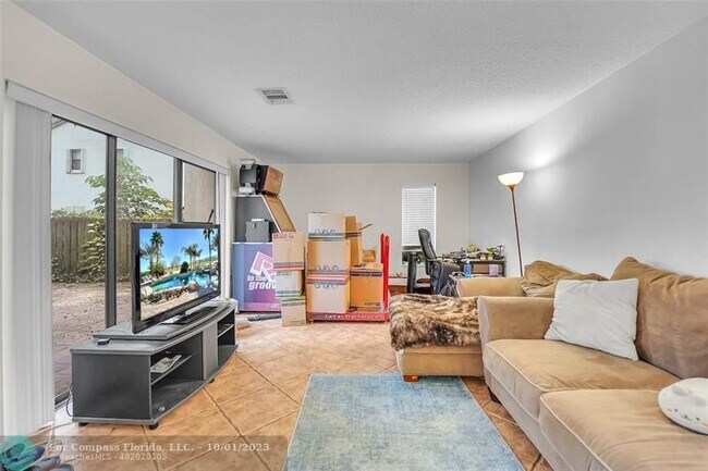 Building Photo - 3655 Cocoplum Cir