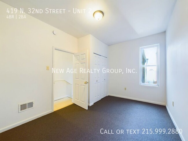 Building Photo - Spacious, Bi-level Apartment Available at ...
