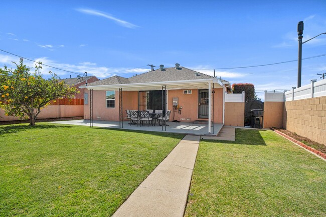 Building Photo - Stunning Remodeled Corner-Lot Home – An En...