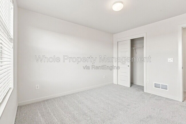 Building Photo - 9004 E 49th Pl