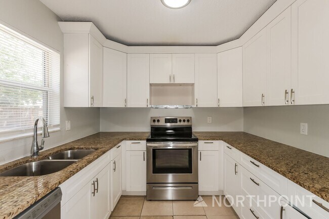 Building Photo - 4 BR/2BA | Newly Renovated Single Family Home |  Fenced backyard!