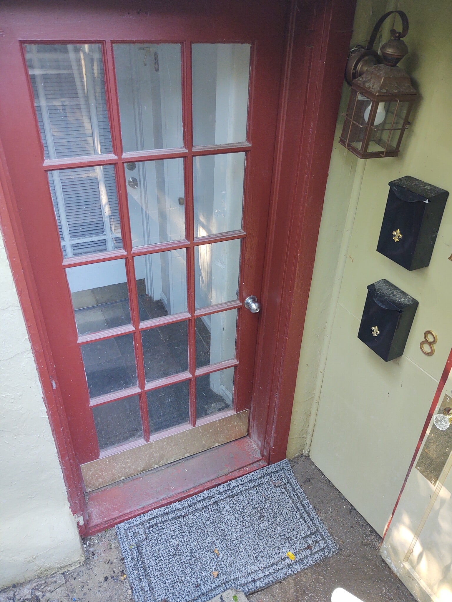 Exterior door with mailbox - 717 W S St