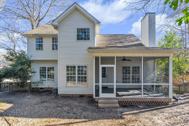 Building Photo - Beautifully Appointed 4BR Home Featuring a Screened Porch, Spacious Living Areas & Community Pool...