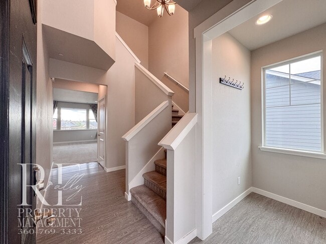 Building Photo - Vaulted Ceilings, Tree-Lined Views & a Spacious Primary Suite Retreat