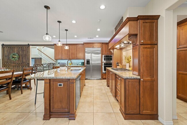 Building Photo - Luxurious 5-Bedroom Pool Home with Solar &...