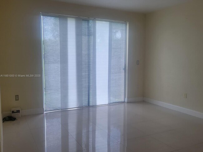 Building Photo - 6671 NW 107th Ct