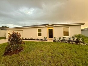 Building Photo - **Move-In-Special** Brand New 4-Bedroom Home in Poinciana – Available Now!