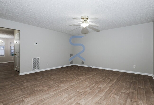 Building Photo - Move in before February 15th and choose your reward: a $250 Amazon Gift Card or a 55" Smart TV!