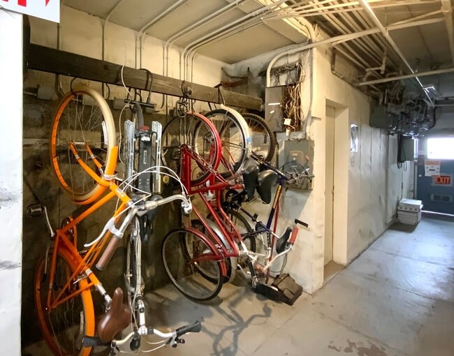 Building Photo - RENOVATED and Private. DISHWASHER, ON-SITE LAUNDRY, HARDWOOD!