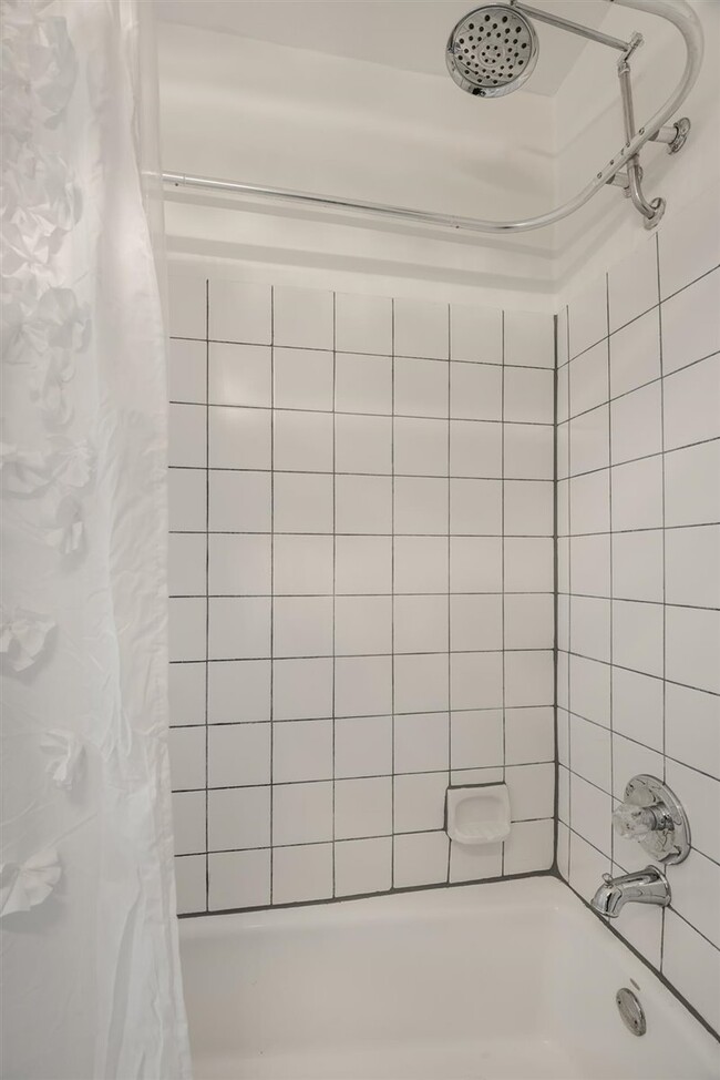 Spacious shower with rainshower head. - 2108 E 23rd St