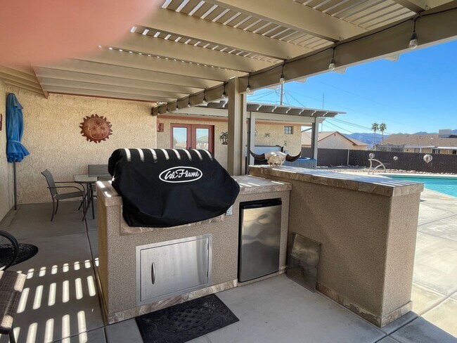 Building Photo - OWNER'S SUMMER SPECIAL-$300 OFF first 3 months! Sparkling Pool Home!