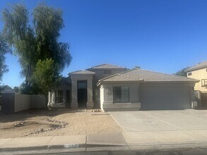 Building Photo - Rare single-level home offers 5 bedrooms and a versatile floor plan designed for comfortable living