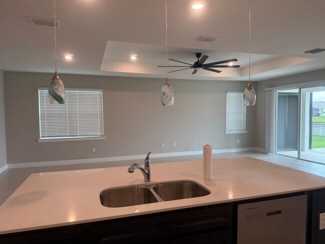 Building Photo - Lakeview Living with Bonus Flex Space & Resort-Style Amenities