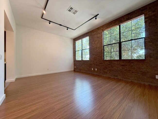 Building Photo - Modern Live/Work Loft In Sought After Depo...