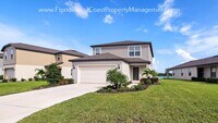 Building Photo - OUTSTANDING LARGE 4 BEDROOM/ 3 BATH HOME IN ISLES AT BAYVIEW! LARGE FLEX SPACE PLUS LAKEIVEWS!