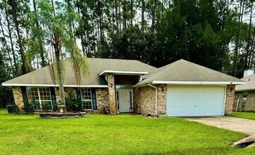 Building Photo - 4-Bedroom / 2-Bathroom Home in Palm Coast