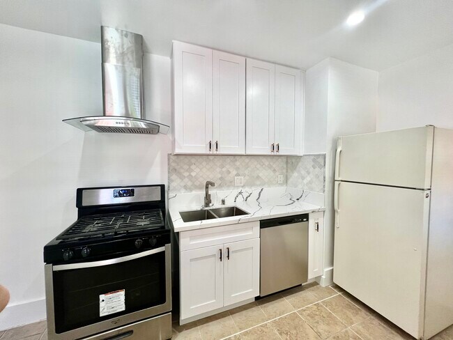 new cabinets and new dishwasher - 1424 E Florida St