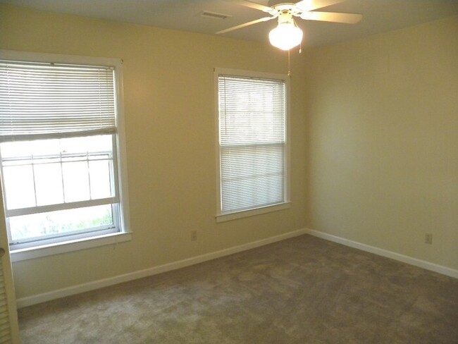 Building Photo - 4BR brick home with rocking chair porch, f...