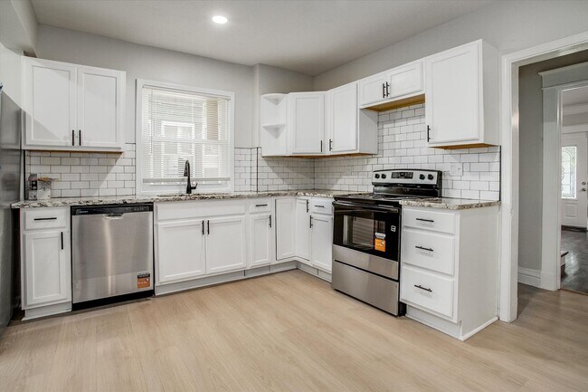 Building Photo - Move fast on this one. Apply within 24 hours of your showing and lock in $250 off your monthly re...
