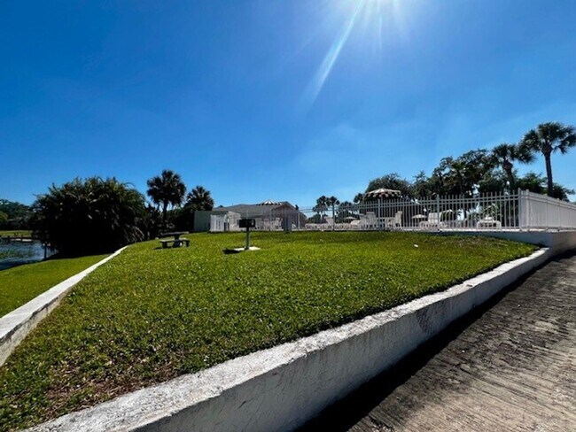 Building Photo - 2X2.5 -MOVE IN NOW! NEW LVP FLOORING ON 1ST FLOOR! NEW CARPET ON 2ND FLOOR! WATER VIEWS! CALL TOD...