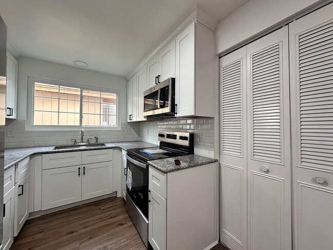 Building Photo - ** Coming Soon** Sandalwood Pool Home