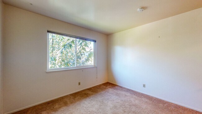 Building Photo - 2 story 2 bedroom 1 bath condo with covered parking, private storage and community pool!