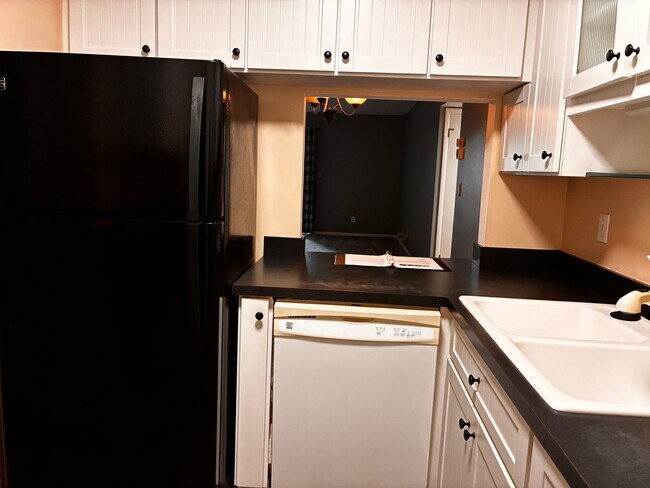 Building Photo - 55+ Charming first-floor condo nestled in the serene Fairways 3 Condominiums