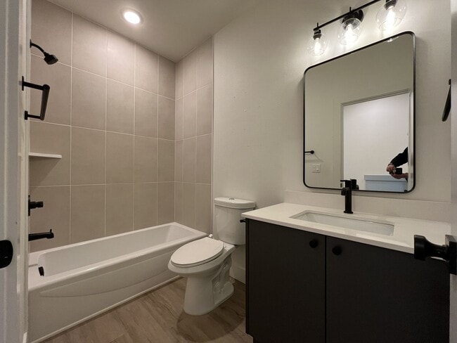 Building Photo - Modern 2-Bed, 1.5-Bath Condo with Custom Kitchen, Private Patio, and Prime Location