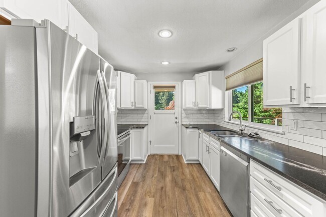 Building Photo - Rare Olympia Rental on Over 2 Acres of Flat, Usable Land!