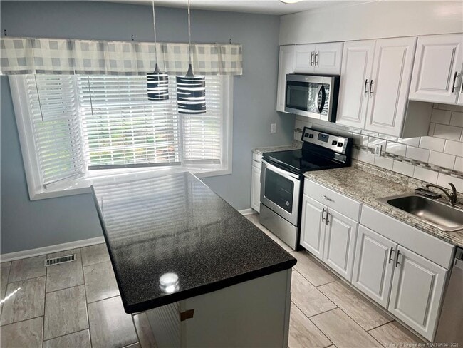 Building Photo - 1302 Kienast Dr