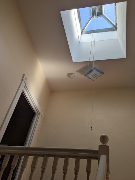 Upstairs hallway and skylight - 2747 Maryland Ave