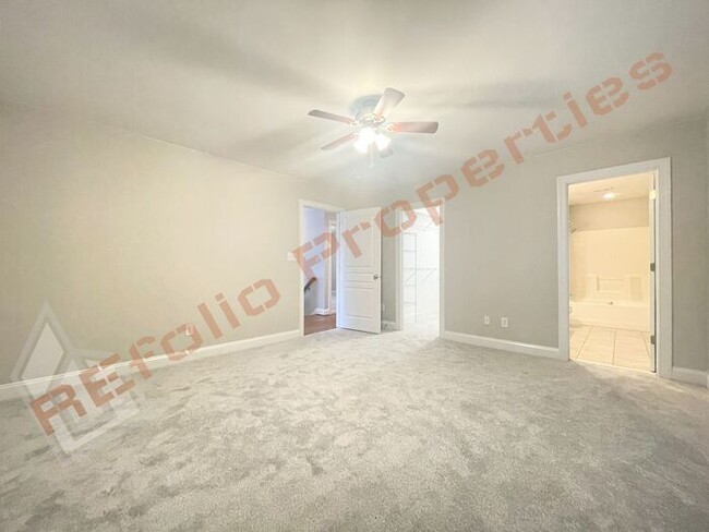 Building Photo - Freshly Painted with New Carpet and Wood F...