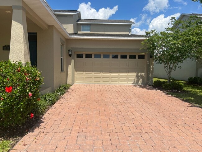 Building Photo - Beautiful 4/3.5 home located in Independence Signature Lakes Community of Winter Garden!