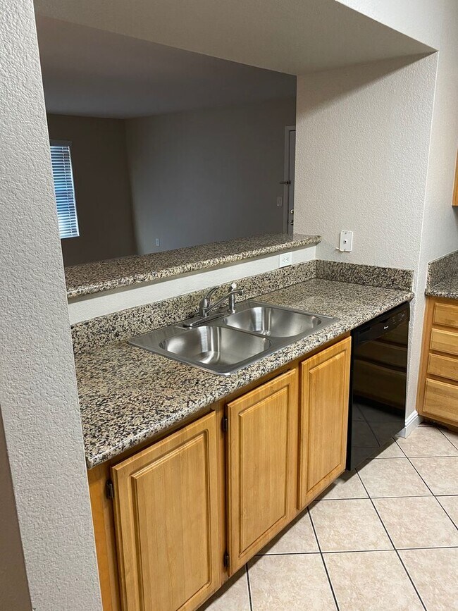 Building Photo - SW!! First floor unit with Balcony!! Gated!! Clubhouse!!  Community pool!! Spa!! Exercise Room!! ...