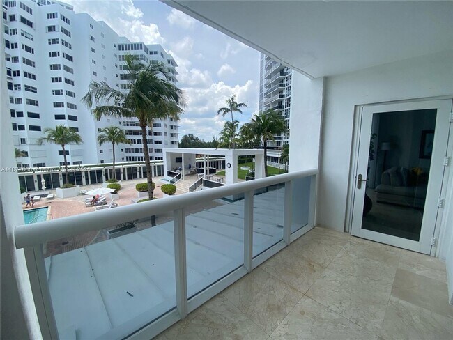 Building Photo - 10275 Collins Ave