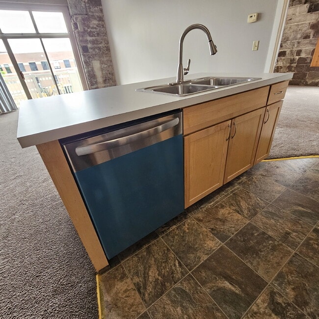 Building Photo - Unique 2 Bedroom Downtown Mount Clemens Loft with Updated Kitchen, Spacious Living Room, Balcony ...