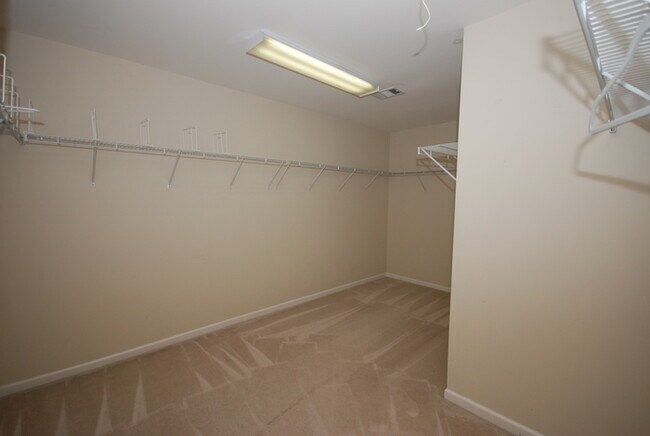 Building Photo - Oversized Executive Style Home with Finish...