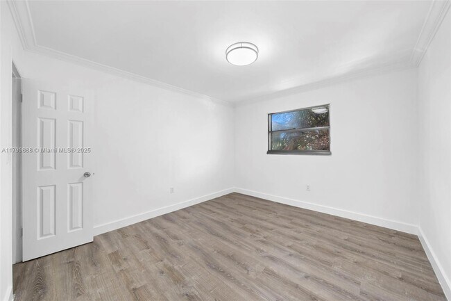 Building Photo - 4335 NW S Tamiami Canal Dr