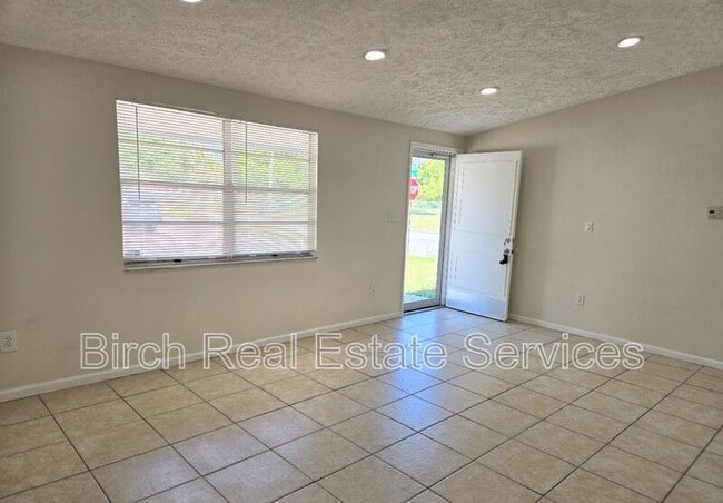 Building Photo - 6448 Reno Ave