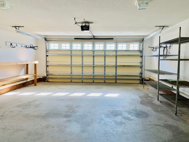Building Photo - Spacious 3 BR House w/ Fenced Backyard and...
