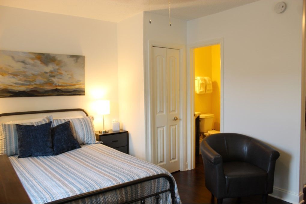 This studio includes a full size bed and chair. - 3813 Gallatin Pike