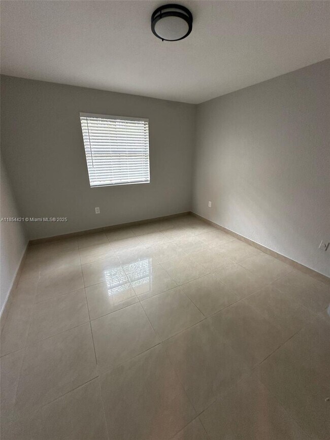 Building Photo - 10581 SW 155th Ct